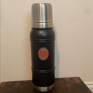 Stanley Black Vacuum Bottle with Red Label